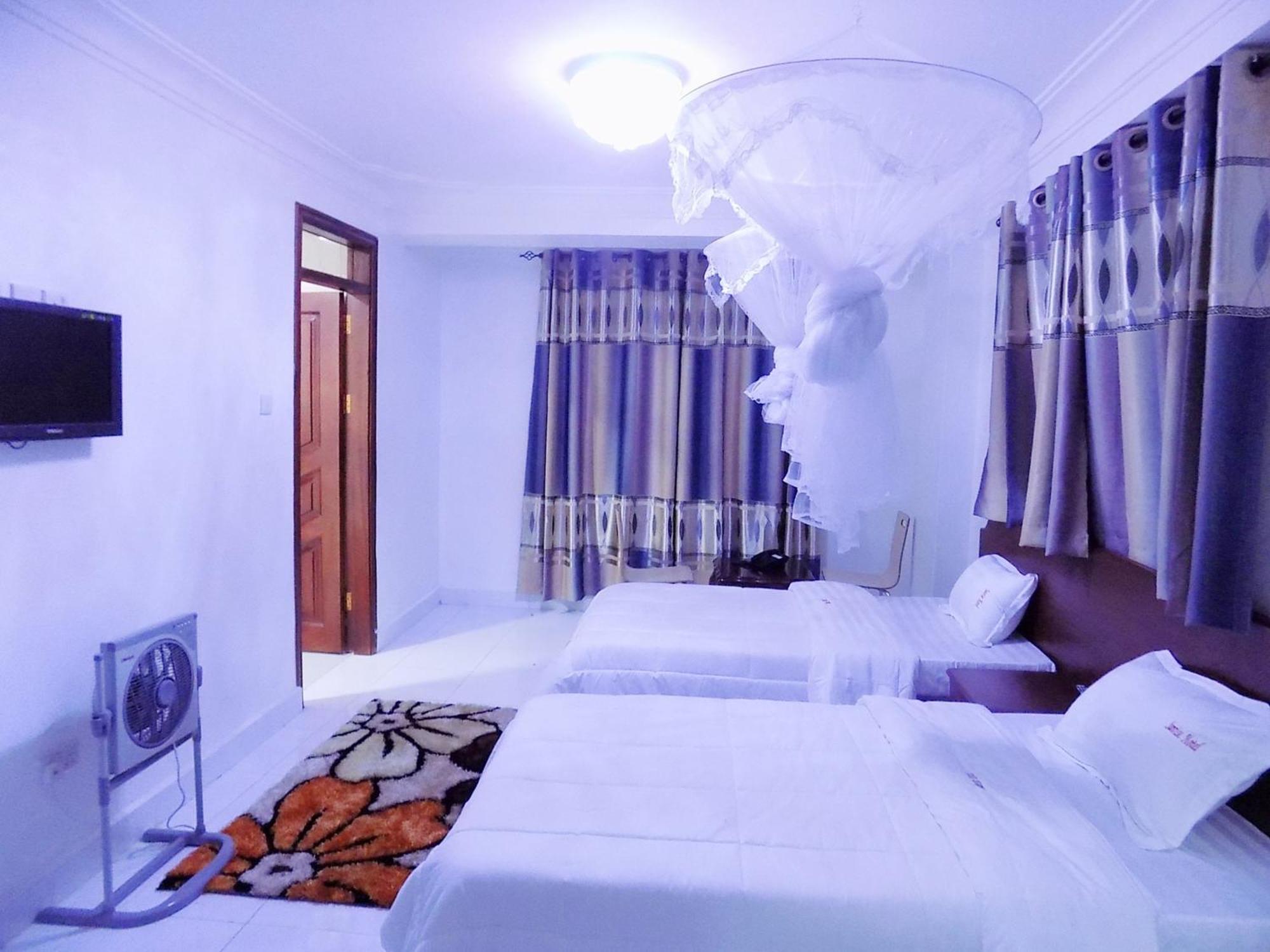 Sunrise hotel kampala Ruang foto