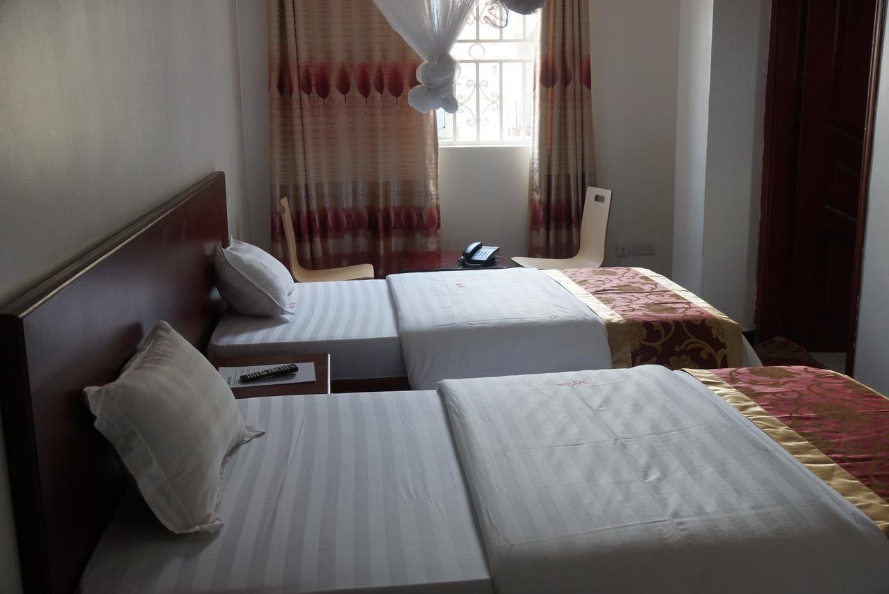 Sunrise hotel kampala Bagian luar foto